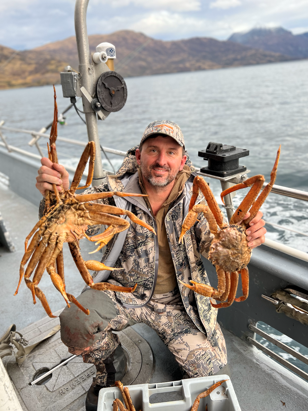 Skipp Knowles with Alaska Crabs in hands 
