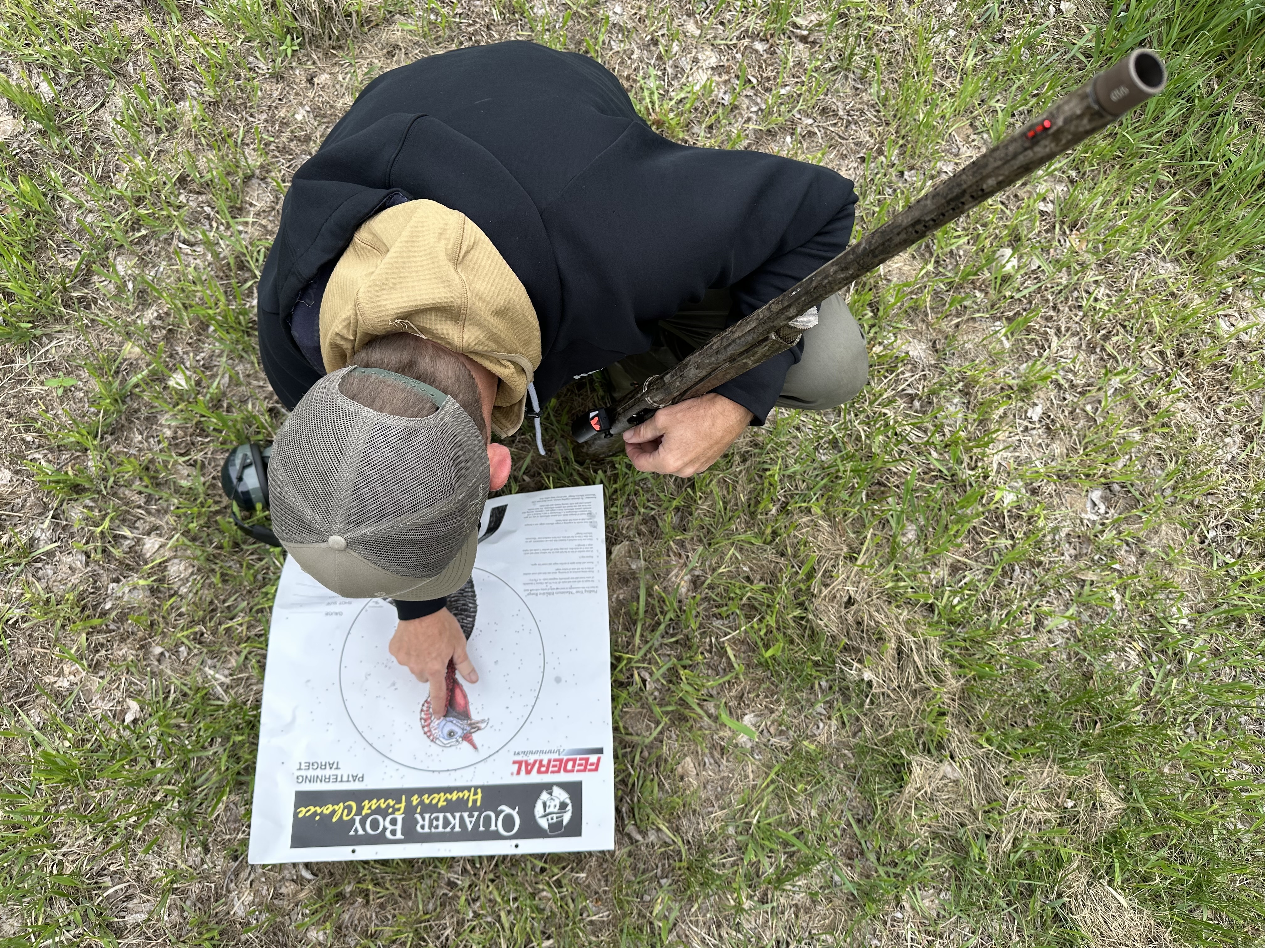 Jason looking at the target showing the Benelli on point with the ammo