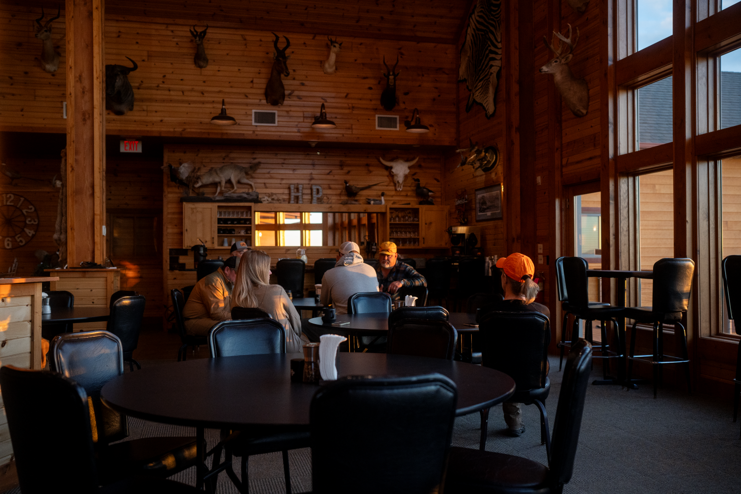 Group of huntersd gathered for breakfast before the hunt 