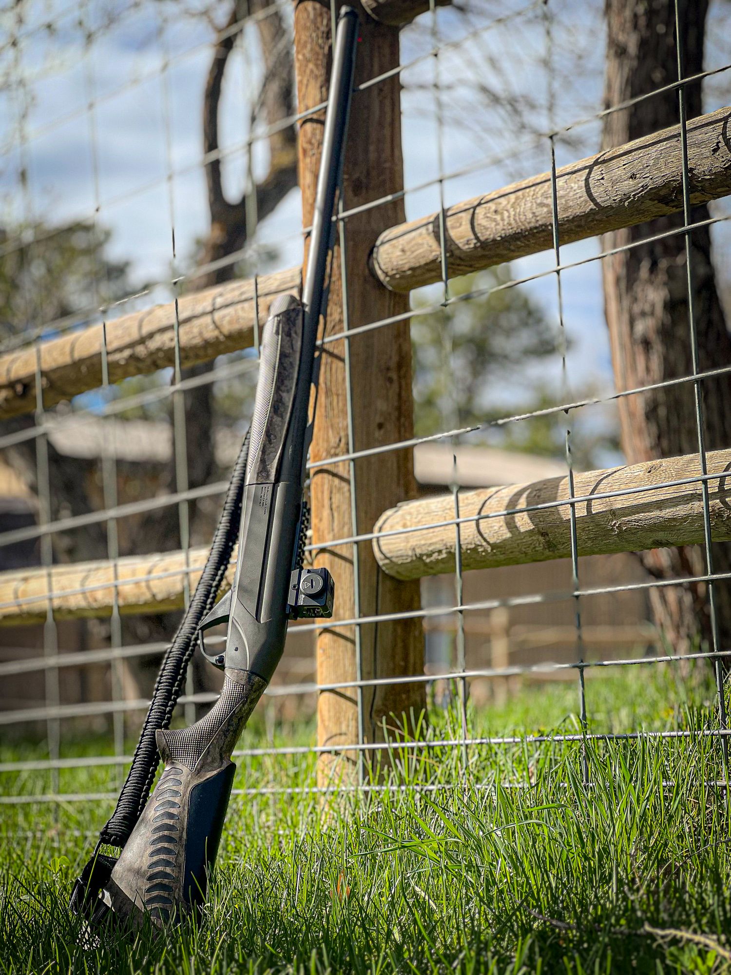 SBE 3 A.I. shotgun up agaisnt a fence a the lodge 