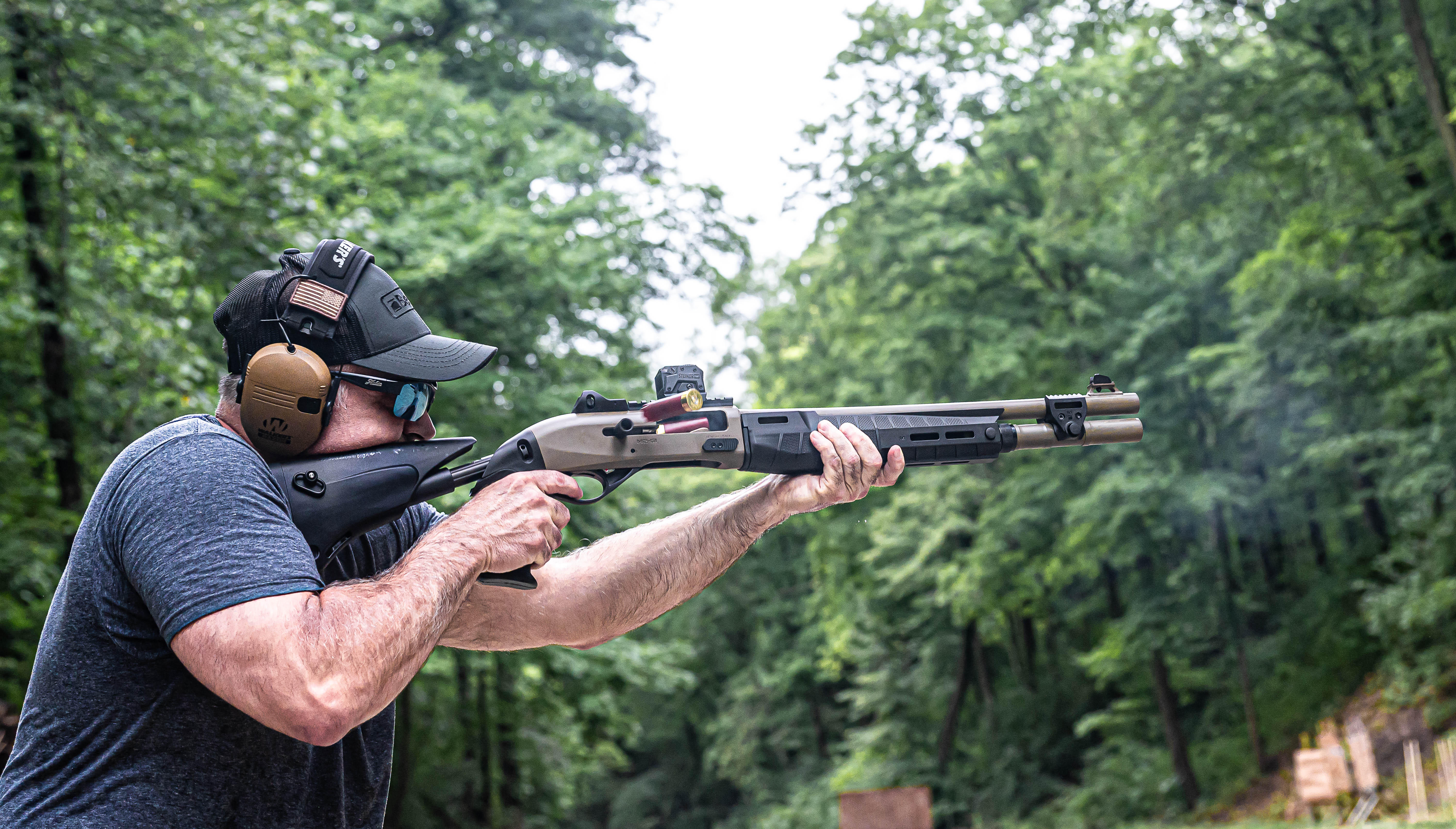 Man shooting the M2-G1 in the field 